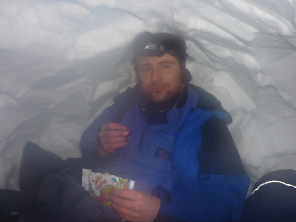 Simon eating in the snowhole